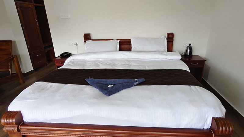 Aakran Cottage comfortable double bed close-up view