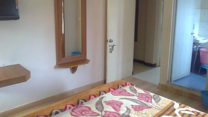 Bedroom with attached bathroom