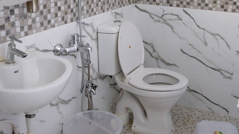 Modern bathroom with western toilet