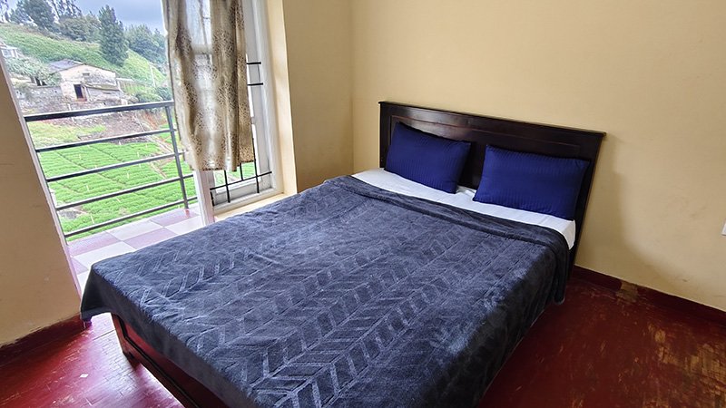 Third bedroom interior with wooden flooring