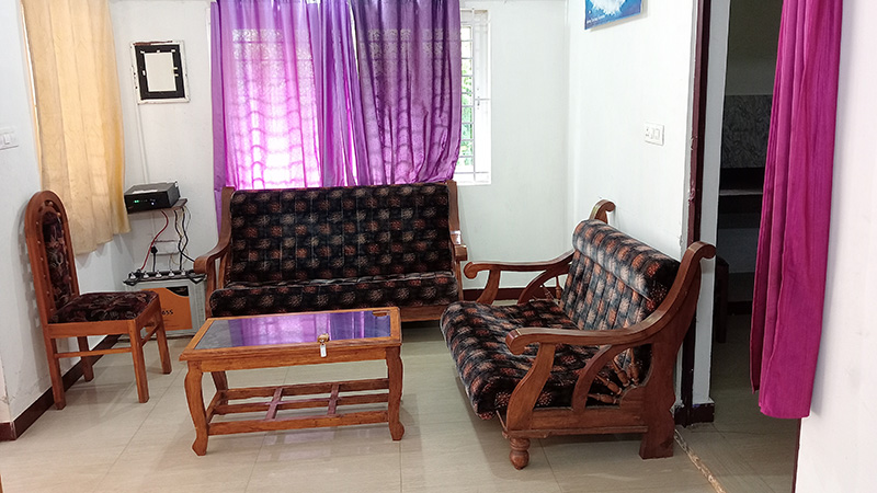 Small living room with wooden furniture