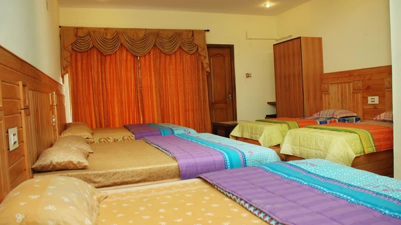 Family room with multiple beds