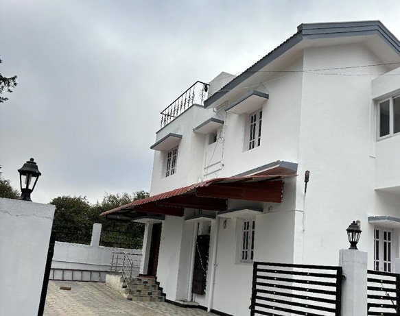 Modern white home stay with gated entrance