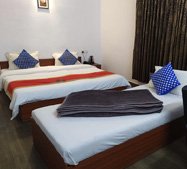 Triple sharing hotel room in Ooty ideal for families or groups
