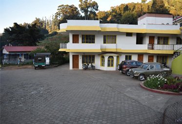Parking area and garden surroundings
