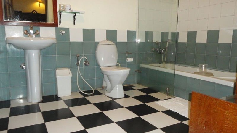 Spacious bathroom with bathtub