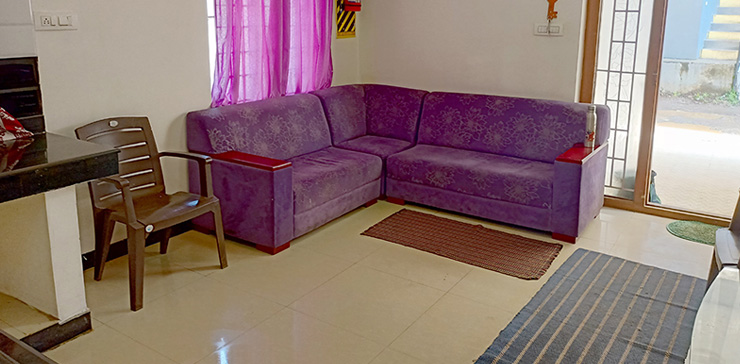 Purple sofa in a cozy space