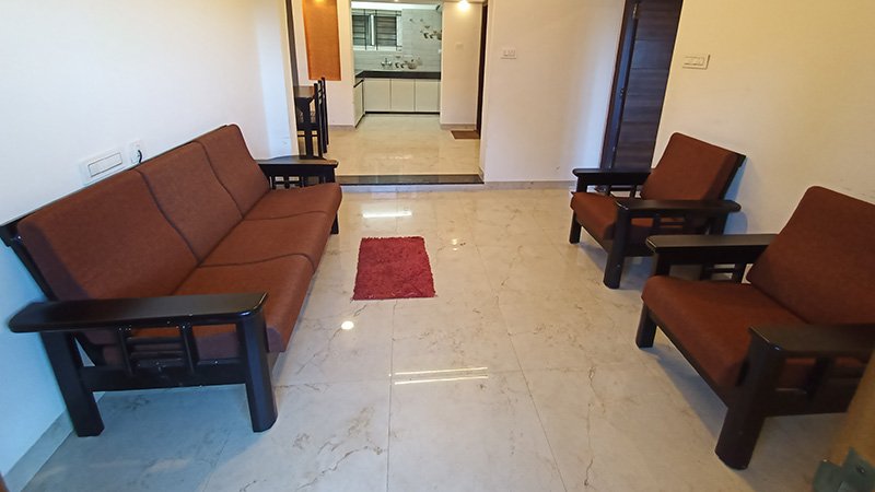 Living room with sofa set and chairs