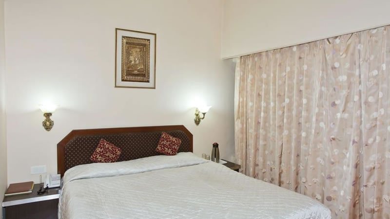 Spacious bedroom with large bed