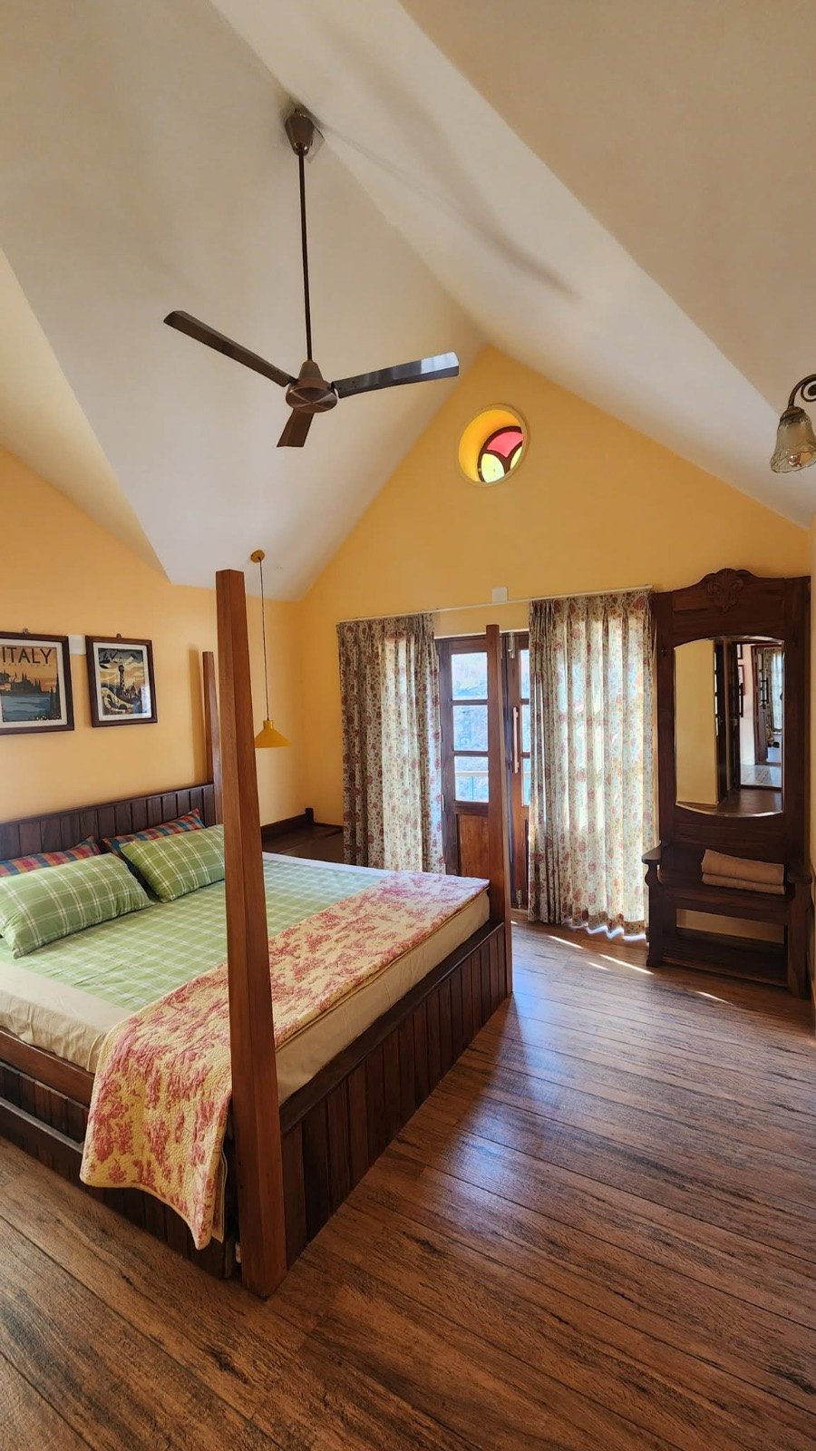 Bright bedroom with sloped ceiling