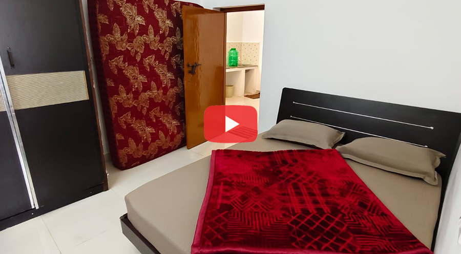 Modern cottage bedroom with double bed and wardrobe in Ooty cottage